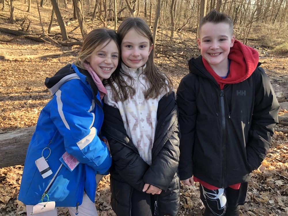 students in the woods on global school play day