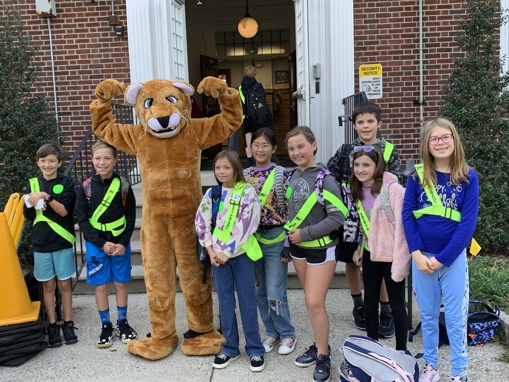 Coolidge Cougar posing with Safety Patrol members for our Walk to School event