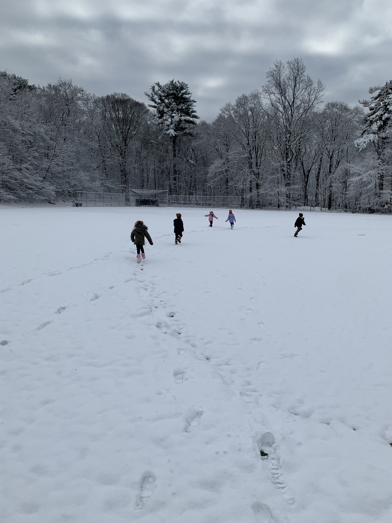 children running in snow