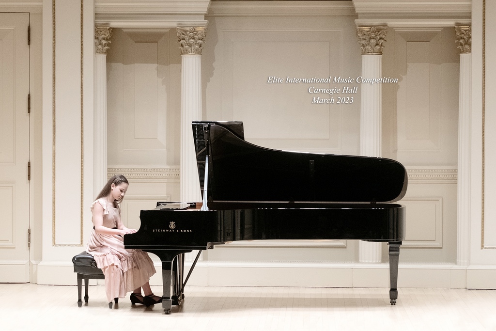 girl playing piano
